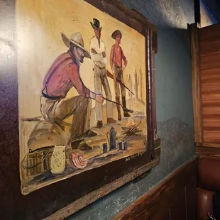 Artwork on Wall above Booth