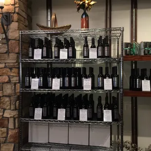 shelves of olive oil and balsamic