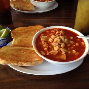 Menudo and glass of horchata