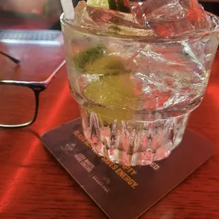 Rum and soda water with a lime.