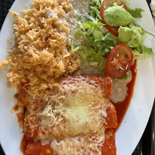 Chicken Enchiladas. Not bad! Had a bone in my enchilada, but I didn&apos;t mind it.