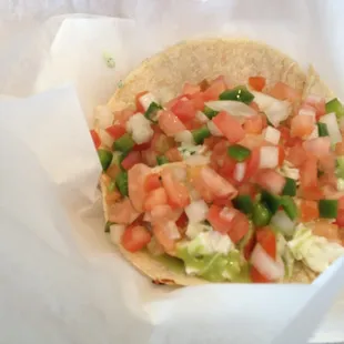 $2.99 plain quesadilla after the Kate treatment - cold slaw, pico, cilantro sauce, and avocado sauce.