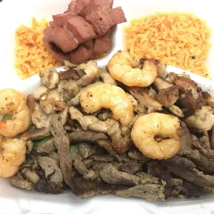 Parrilladas Supreme (Beef Fajita, Chicken Fajita, Shrimp, Sausage, Rice, Beans, Salad, Pico, Guac, and Corn Tortillas)