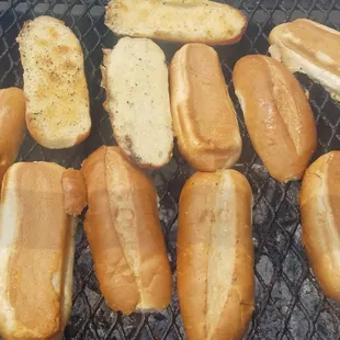 Toasting the garlic bread and/or rolls over the fire gives it a huge burst of flavor.