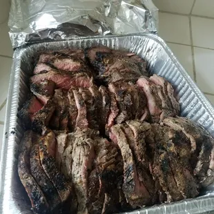 Freshly barbecued tri tip ready to head out to a client for lunch.