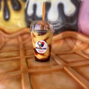 a cup of coffee on a waffle