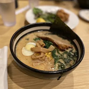 a bowl of ramen on a table