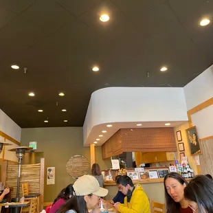 Interior of restaurant and part of kitchen.