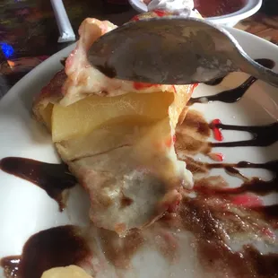 Apple enchilada. Not sure if it's supposed to have pie filling but it was nothing but just fresh apple slices.