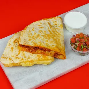 Quesadilla with pico and sour cream