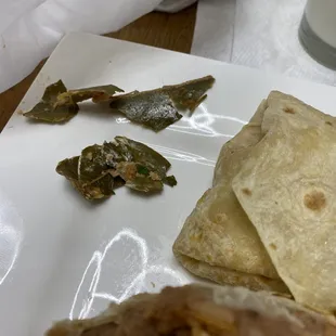 Bay leaf in chili Reno burrito. Bay leaves are not edible!!!!