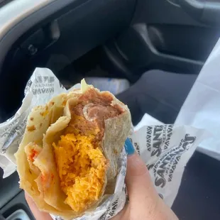 Bean And Cheese Burrito, mounds of cold, unmelted cheese.