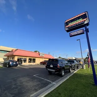 a car parked in front of a restaurant