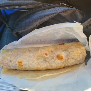 A fuckn $13.67 piece of shit adobada burrito.