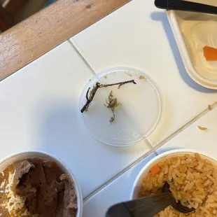 two bowls of rice and a spoon
