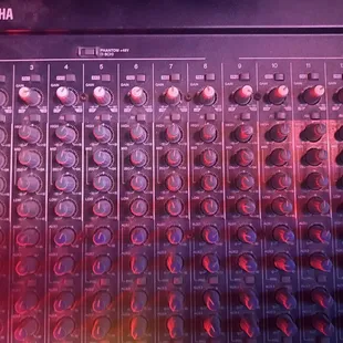 a close up of a mixing board