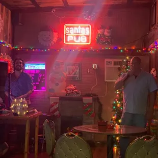 a man singing in a bar