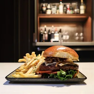 a burger and french fries on a plate