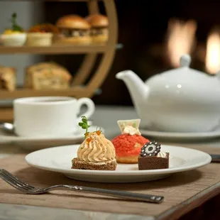 a plate of desserts on a table
