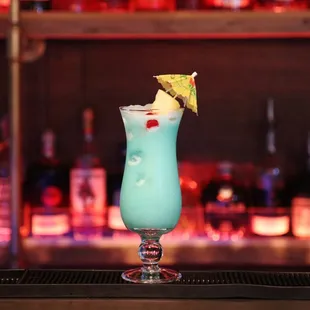 Miami Vice is not just fun to take selfies with.  It is serve with white rum, blue curacao, pineapple juice and coconut cream.