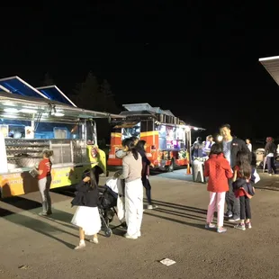 a group of people at a food truck