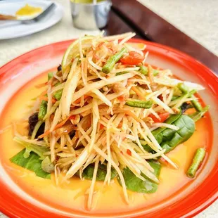 Papaya Thai salad.... It was not great... not spicy... needs to all lemons to it