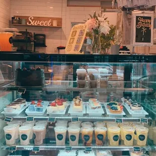a display of cakes and pastries
