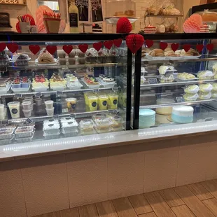 a display of cakes and pastries