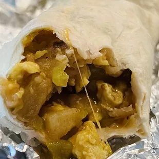 Breakfast burrito with eggs, potatoes, cheese and chorizo.