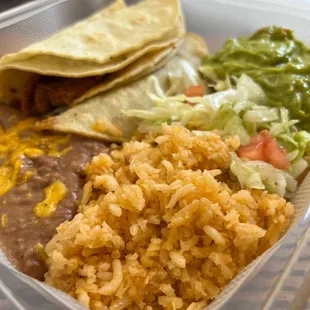 Carnitas street tacos with rice and beans