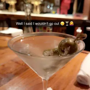 Lightly dirty kettle one martini with blue cheese olives
