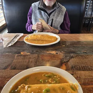 Breakfast burritos smothered and green chili. Great breakfast with dad!
