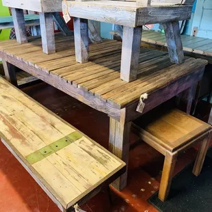 Custom made rustic repurposed benches and tables