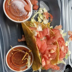 2 ground beef tacos with extra tomatoes