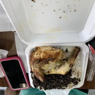 chicken and rice in a styrofoam container