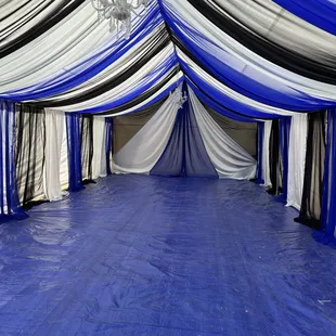 Tent 20x40 with black, silver and royal blue draping