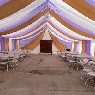 Tent 30x60 with draping tables and chairs