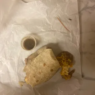 Toothpick and something that looks like mouse/rat droppings found after my husband takes a bite of his burrito.