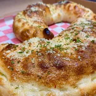 Delicius Calzone 
-Mozzarella
-Ricotta
you can add any ingredients we have available.
Come and meet the new administration at Santinos.