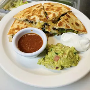a quesadilla and guacamole