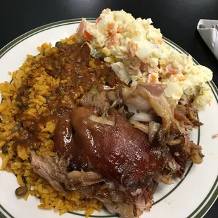 Pernil, potato salad &amp; moro de gandules with sauce from beef stew