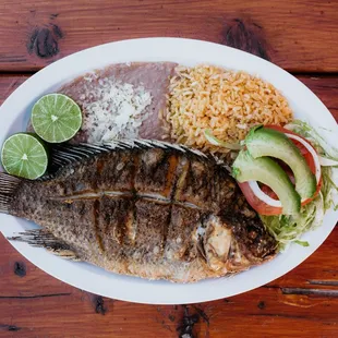 Mojarra Plate: Crispy Tilapia w/beans, rice, salad!
