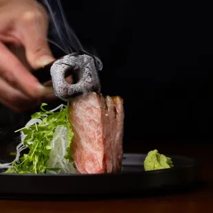 Binchōtan Seared O'toro sashimi