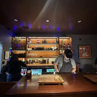 a man preparing food in a restaurant