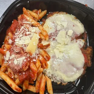 a plate of pasta and meat