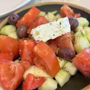 This was the happy hour Greek salad minus the onions it&apos;s amazing