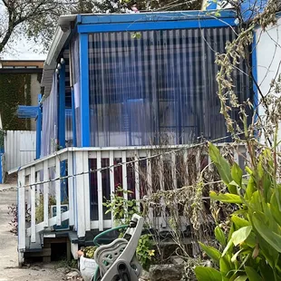 The popular outdoor seating is protected from the weather.