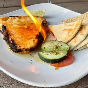 Saganaki- flaming cheese with pita