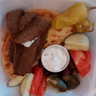 Greek platter, $6.25 - soooooo good and filling! Kalamata olives, gyro meat, pita, cucumber, tomatoes, pepperoncino.