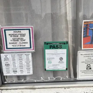 a window display with posters and information